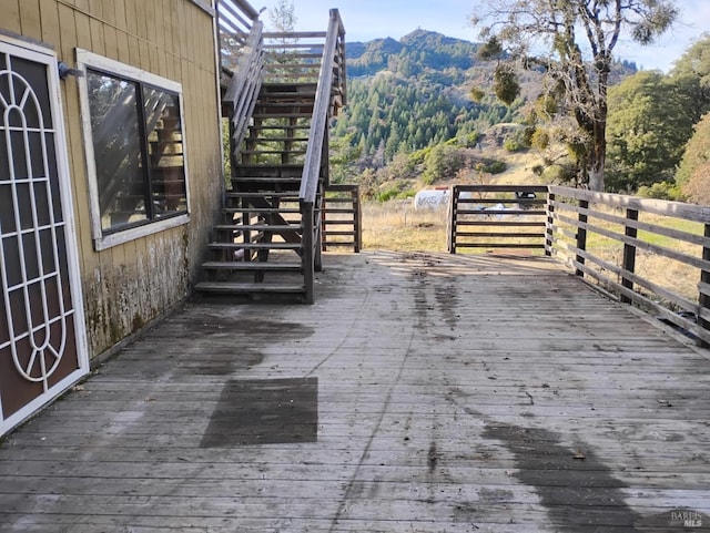 wooden terrace with a mountain view