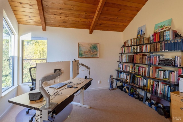 carpeted office space with lofted ceiling with beams, plenty of natural light, and wooden ceiling