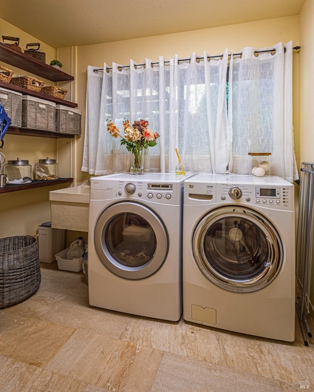 laundry area with washer and clothes dryer