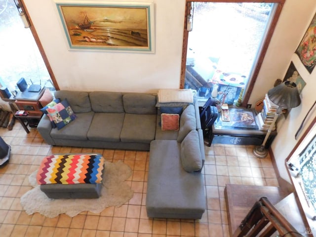 living room with tile patterned flooring