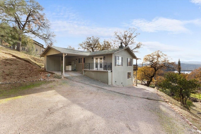 view of front of house featuring a carport