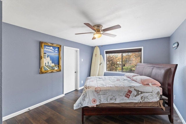 bedroom featuring ceiling fan and dark hardwood / wood-style floors