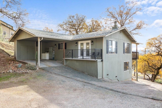 view of front of house with a carport