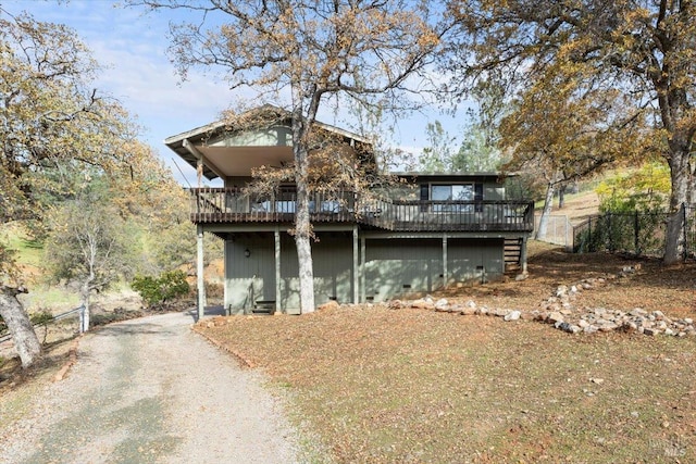 view of front of house with a deck