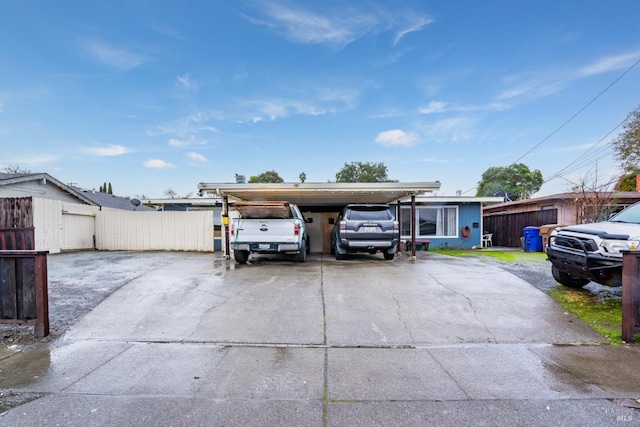 view of front of home featuring a carport