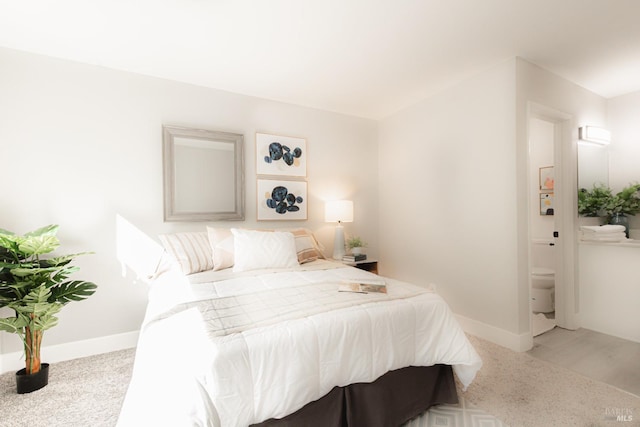 bedroom featuring baseboards