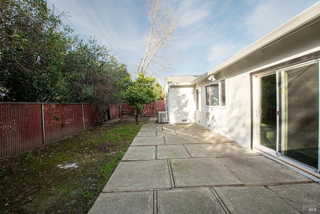 view of patio / terrace featuring a fenced backyard and central AC unit