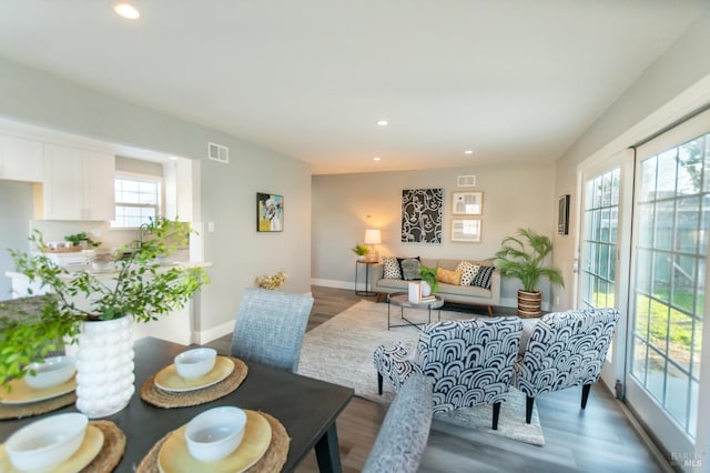 dining area featuring recessed lighting, visible vents, and wood finished floors