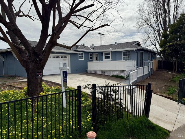 ranch-style house featuring a garage