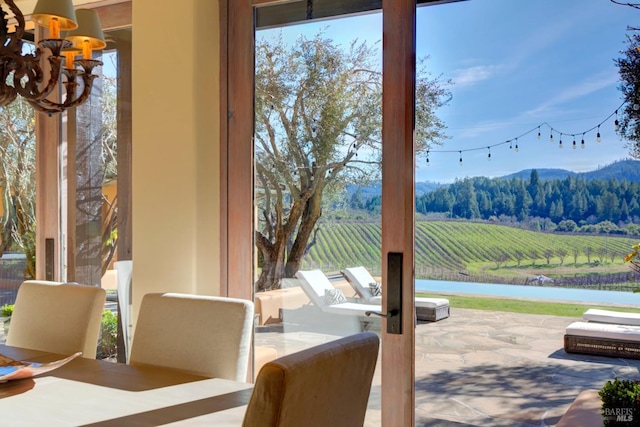 interior space with a mountain view and a rural view