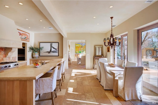 dining room featuring a chandelier