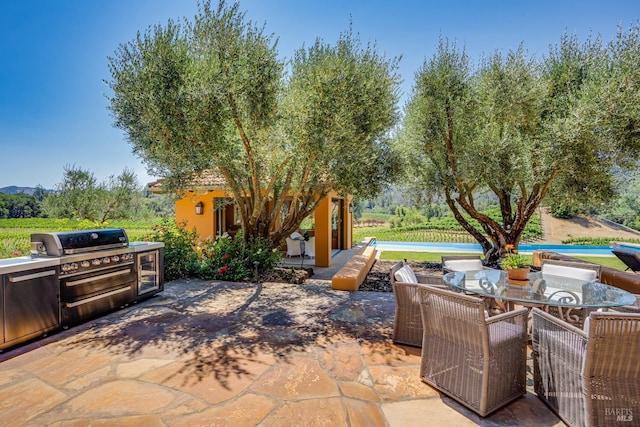 view of patio with an outdoor kitchen