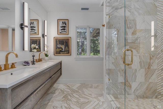 bathroom with vanity and an enclosed shower