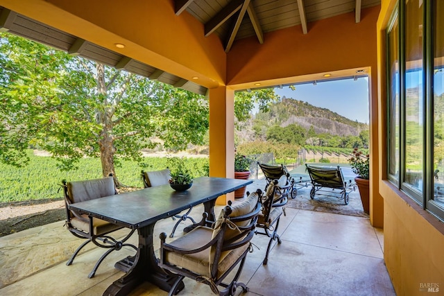 view of patio / terrace with a mountain view