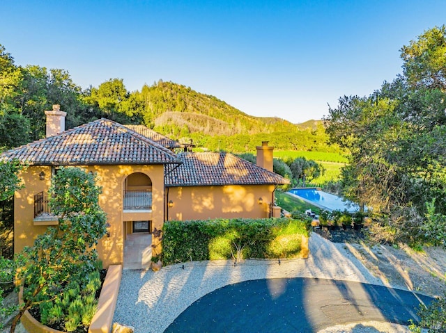 view of front of home with a mountain view