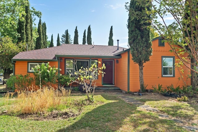 view of front of house with a front yard