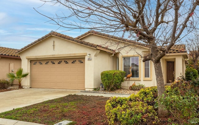 view of front of property with a garage