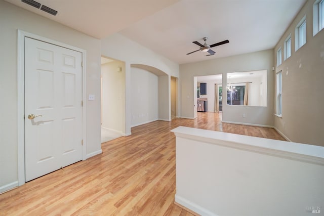 unfurnished room featuring ceiling fan and light hardwood / wood-style floors