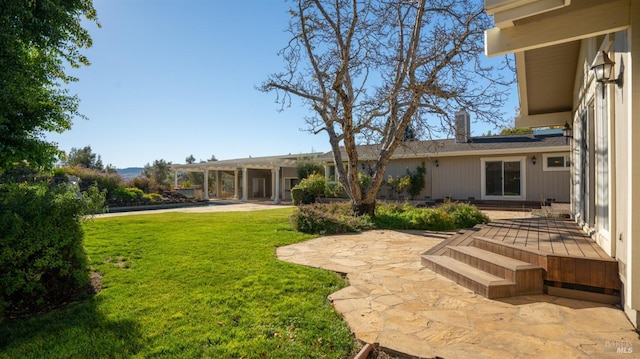 view of yard featuring a patio area