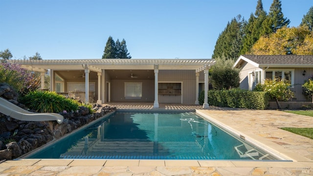 back of property featuring a patio area and ceiling fan