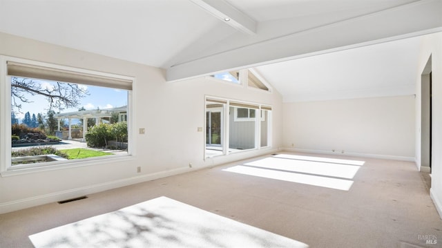 interior space featuring lofted ceiling with beams