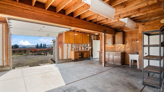 garage with wood walls