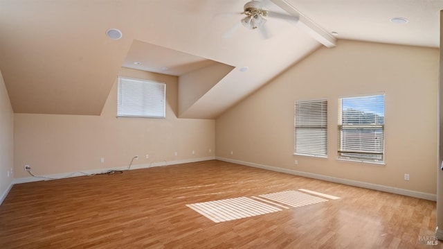 bonus room with vaulted ceiling with beams, ceiling fan, and light wood-type flooring