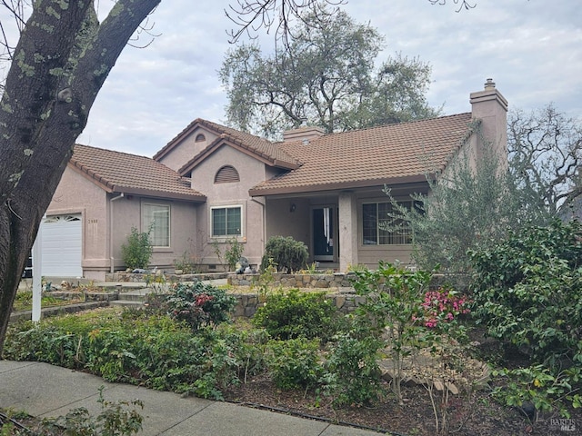 view of front of home with a garage