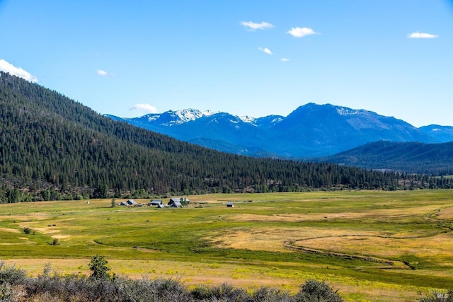 view of mountain feature with a rural view