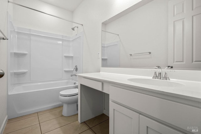 full bathroom with tile patterned flooring, vanity,  shower combination, and toilet