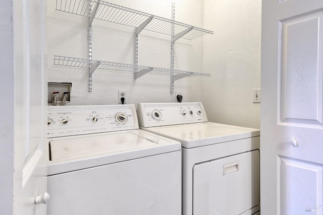 laundry room featuring independent washer and dryer