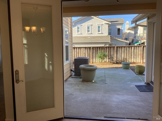 doorway with concrete flooring