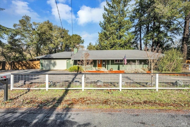 single story home with a garage