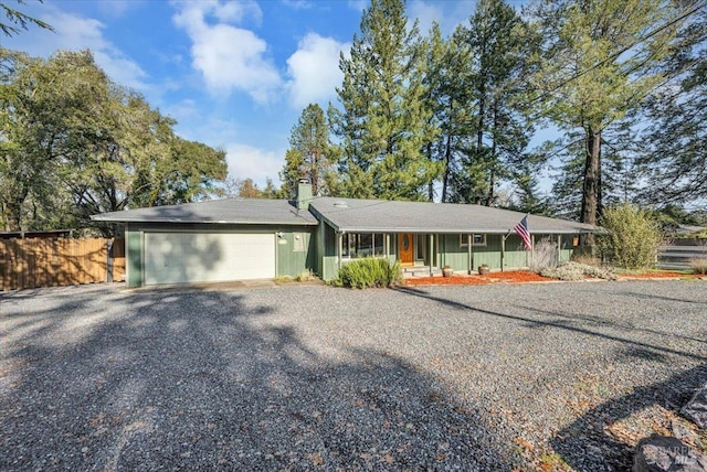 ranch-style house featuring a garage