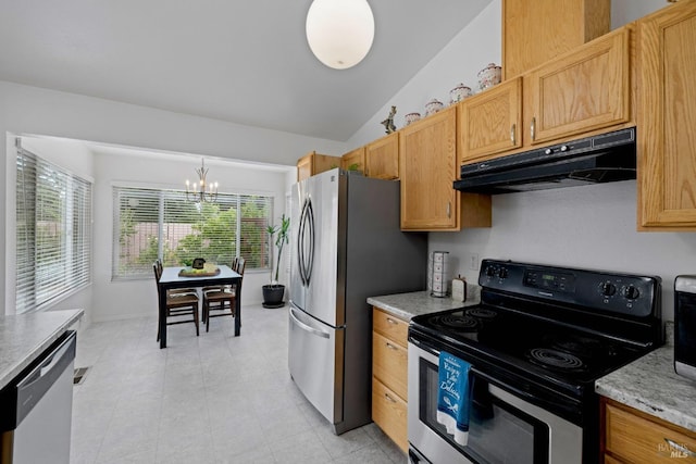 kitchen with an inviting chandelier, under cabinet range hood, vaulted ceiling, and stainless steel appliances