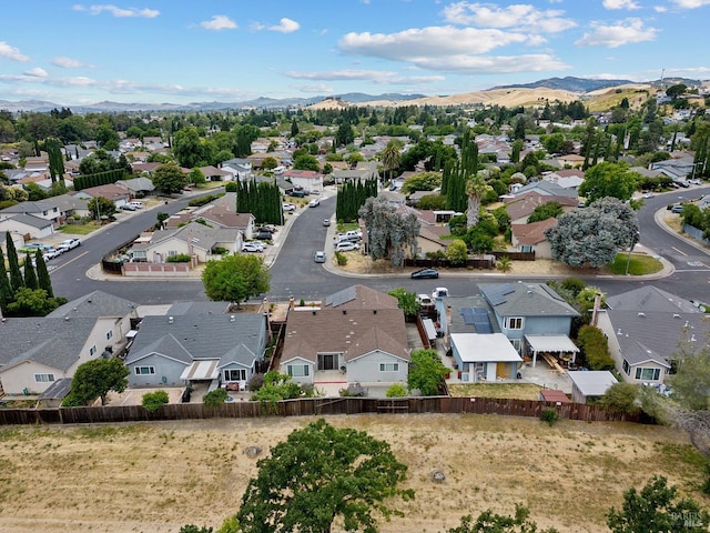 birds eye view of property with a residential view and a mountain view