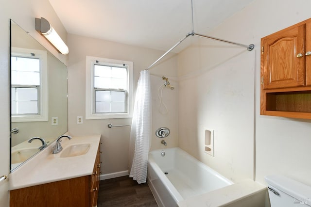 full bathroom with toilet, shower / bath combination with curtain, hardwood / wood-style floors, and vanity