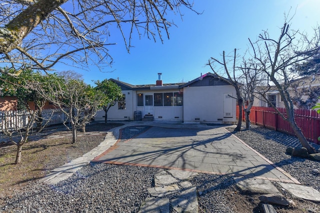 rear view of property with a patio area