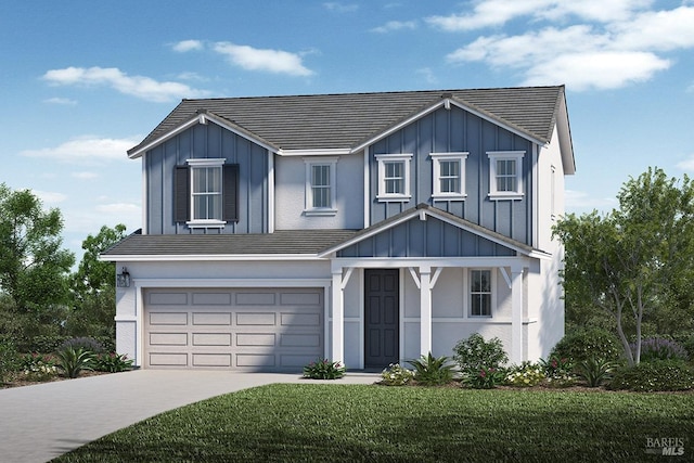 view of front facade featuring a garage and a front lawn