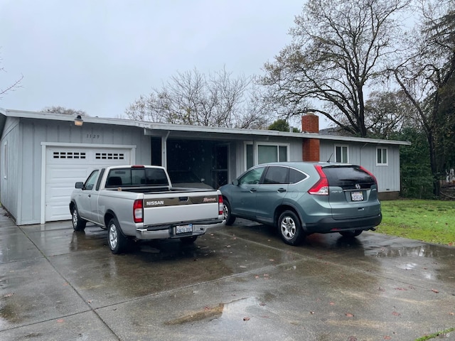 single story home featuring a garage