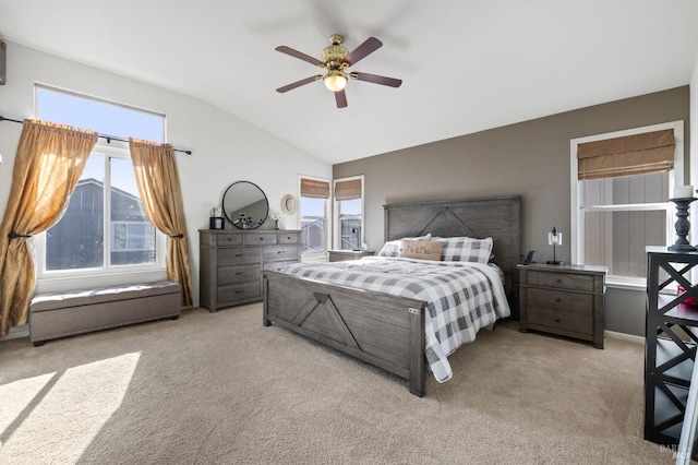 bedroom featuring light colored carpet, ceiling fan, and lofted ceiling