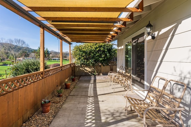 view of patio featuring a pergola