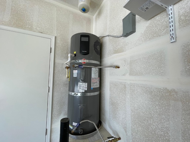 utility room with secured water heater