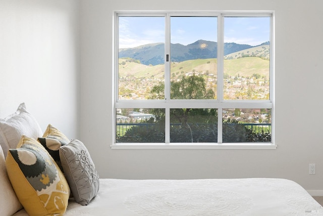 bedroom with a mountain view