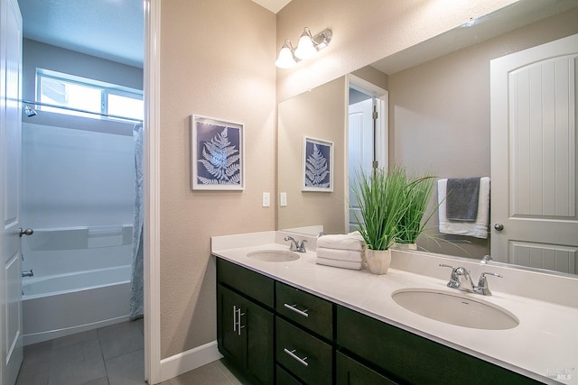 bathroom featuring tile patterned flooring and vanity