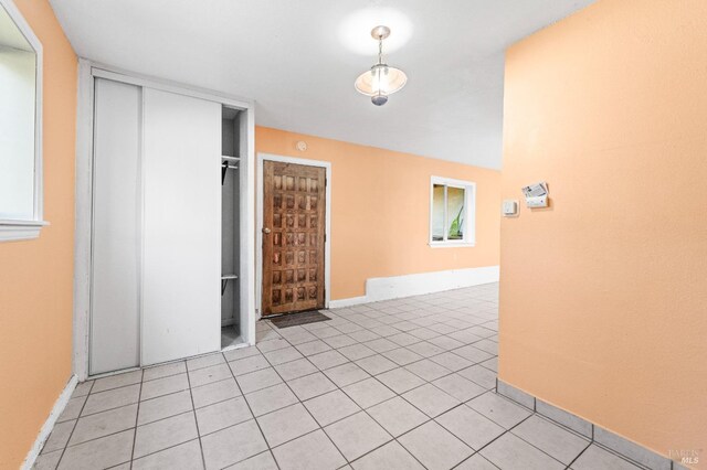 interior space featuring light tile patterned flooring