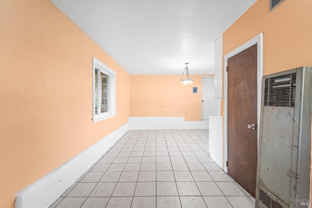 interior space featuring light tile patterned floors