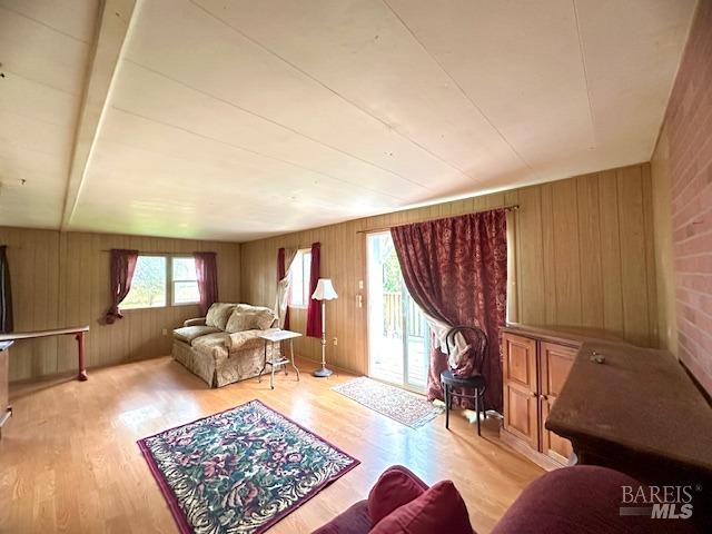 living room with light hardwood / wood-style floors