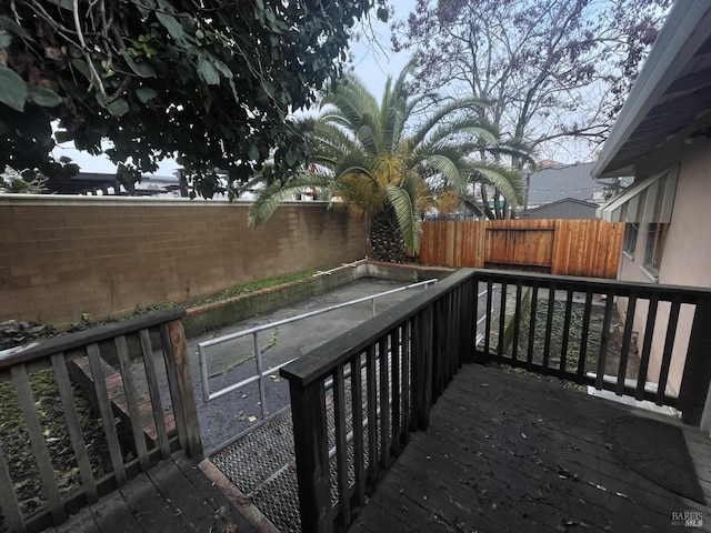 deck featuring a fenced backyard