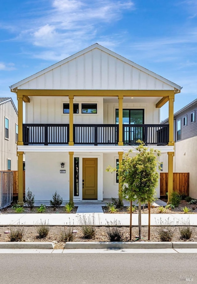 9017 Camino Colegio Rd, Rohnert Park, CA 94928 - view of front of property featuring a balcony, fence, and board and batten siding